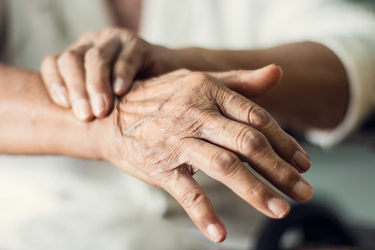Close up hands of senior elderly woman patient suffering from pakinson's desease symptom. Mental health and elderly care concept 1783640370 c1cbc4fb43554d4f9776e703a9c8c403 1